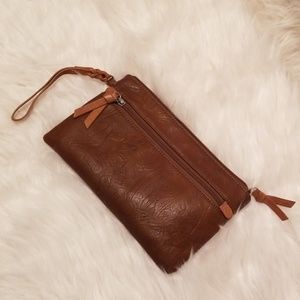 Brown leather clutch